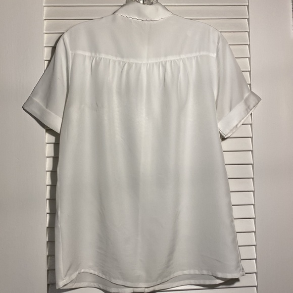White eyelet collar/front, short sleeves, gathered back, 100% polyester. - Picture 6 of 8